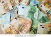 big-stack-euro-money-on-260nw-2377476679.jpg